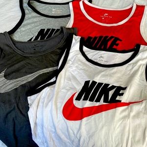 4 for 1 Nike Tank Tops